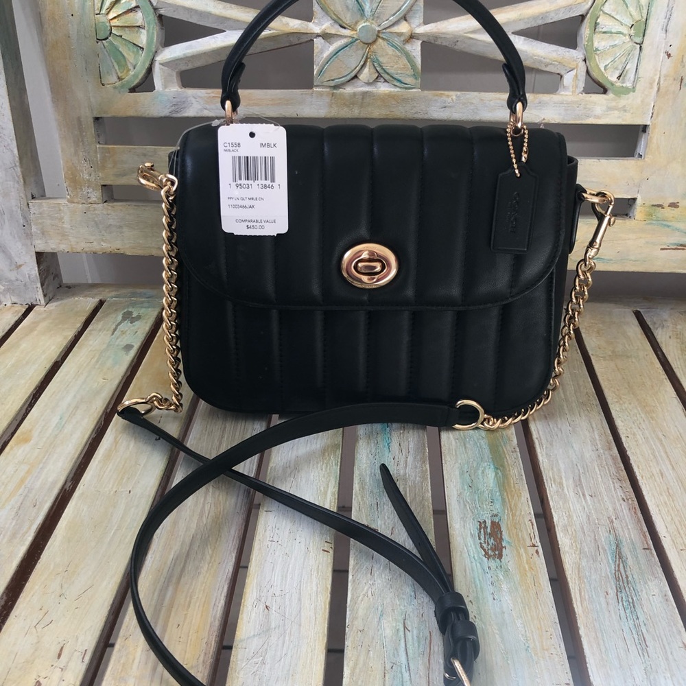 Coach purse. New. Never used. Received as a gift.